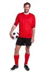 Fototapete Footballer cut out on white © RTimages