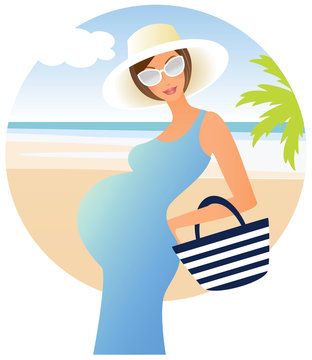 Young attractive pregnant woman on the beach