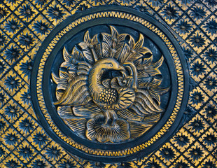 Wooden carved peacock