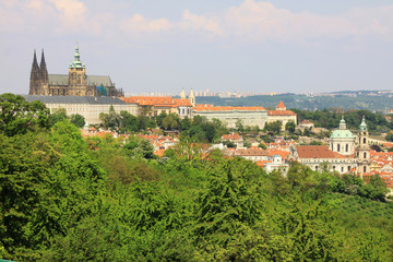 Fototapeta na wymiar View on the spring Prague gothic Castle with the green Nature