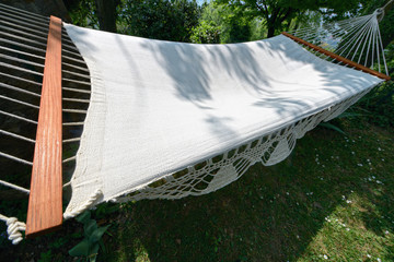 Croched spreader bar hammock in a garden