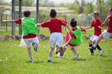 Little Boy playing soccer