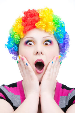 Astonish clown with rainbow make up