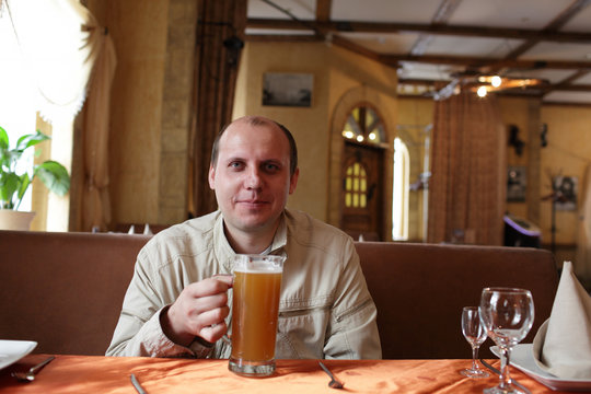 Happy man with beer