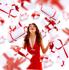 Excited attractive woman with many gift boxes and bags.