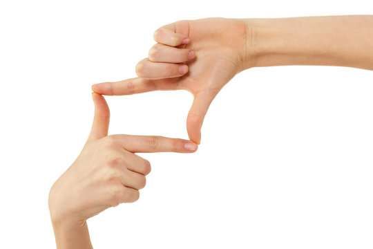 finger photo frame female hands gesturing isolated on white