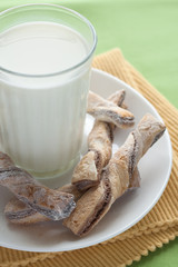 A glass of milk and tasty cookies