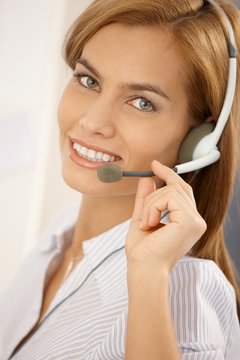 Portrait of confident call center girl