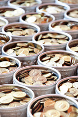 bronze coin in the silver dipper