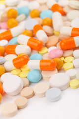Obraz na płótnie Canvas Colorful tablets with capsules
