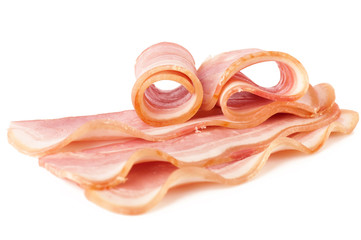 Tasty sliced pork bacon isolated on white background