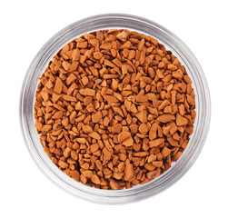 Instant granulated coffee heap in transparent glass bowl, isolat
