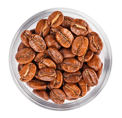 Natural coffee beans heap in transparent glass bowl, isolated on