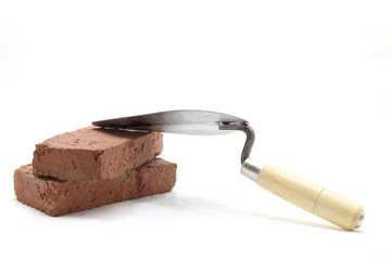 trowel with red brick