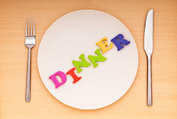 Plate with letters on the white background