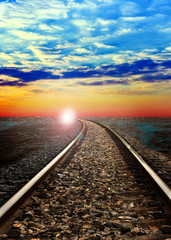 Close up the railway to horizon with sunset