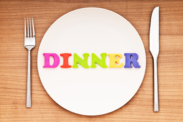 Plate with letters on the white background