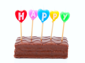 happy birthday candles on chocolate cake