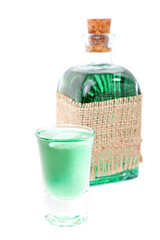 glass of  liqueur / mint drink and bottle