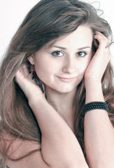 Obraz premium Sensual young woman with beautiful long brown hairs