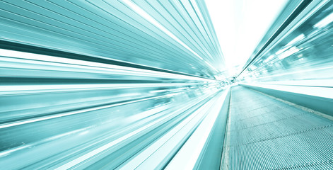 blurry modern escalator in business center