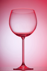 Wine glasses against gradient background