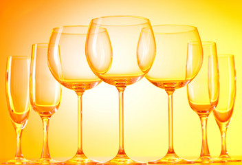 Wine glasses against gradient background