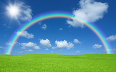 Green field and rainbow