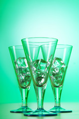 Glasses of water against gradient background