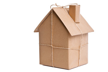 House wrapped in brown paper cut out
