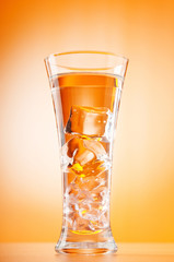 Water in the glass against gradient background