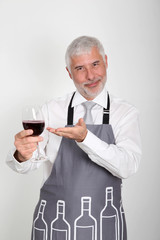 Wine waiter standing on white background