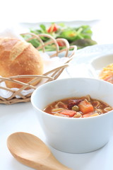 Minestrone soup with bread and green salad