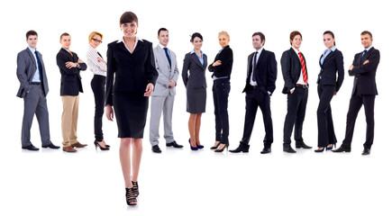 Fototapeta premium Female leader walking, team behind