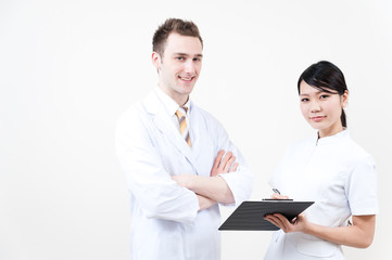 Fototapeta premium young doctor and nurse working