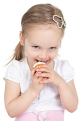 Closeup portrait of sweet little girl with cake