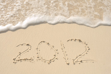 The Year 2012 Written in Sand on Beach