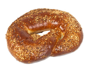 Pretzel with crushed nuts.