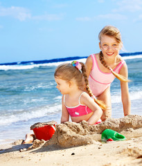 Children playing on  beach.