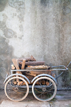 wheelbarrow with logs