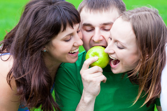 People Eating An Apple