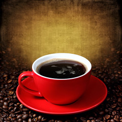 Cup of coffee on grunge textured background
