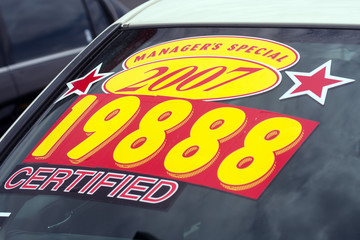 price sticker on used car lot
