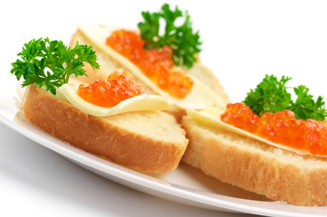 Canapes with salmon caviar