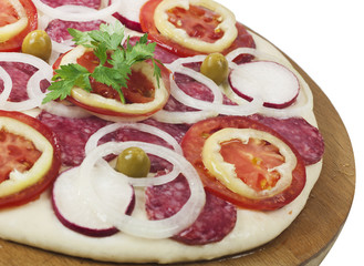 process of making pizza with ham and tomatoes