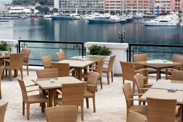 restaurant terrace overlooking yacht harbor