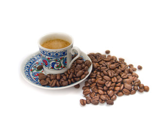 coffee in  turkish small cup isolated over white
