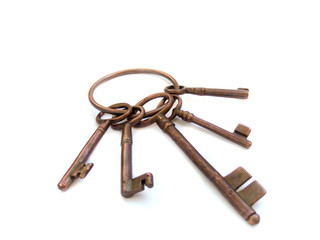 vintage skeleton keys on ring  isolated over white background