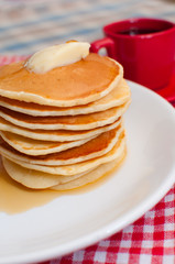 Pancakes With Butter and Maple Syrup