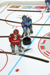 Hockey players duel.